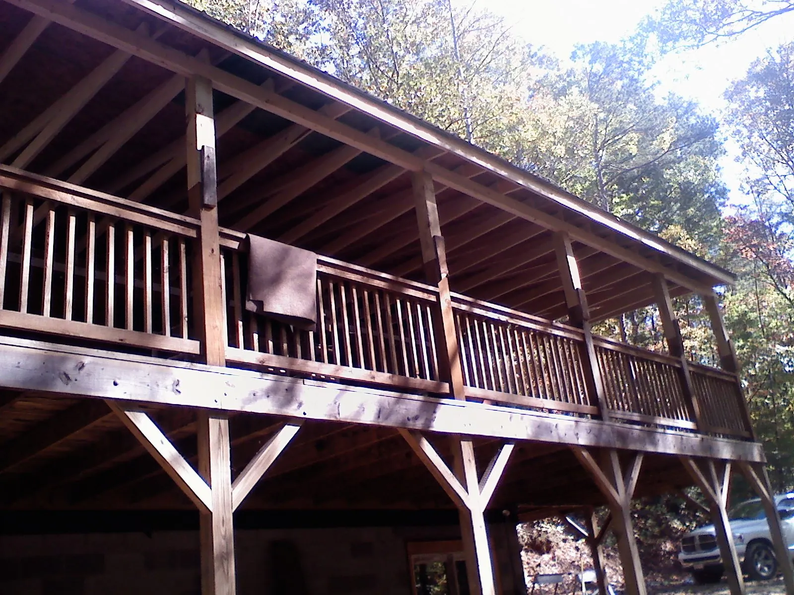 Timber framing under a new elevated porch and deck — Roof Leak Repair in Reynolds by Roofing Brothers